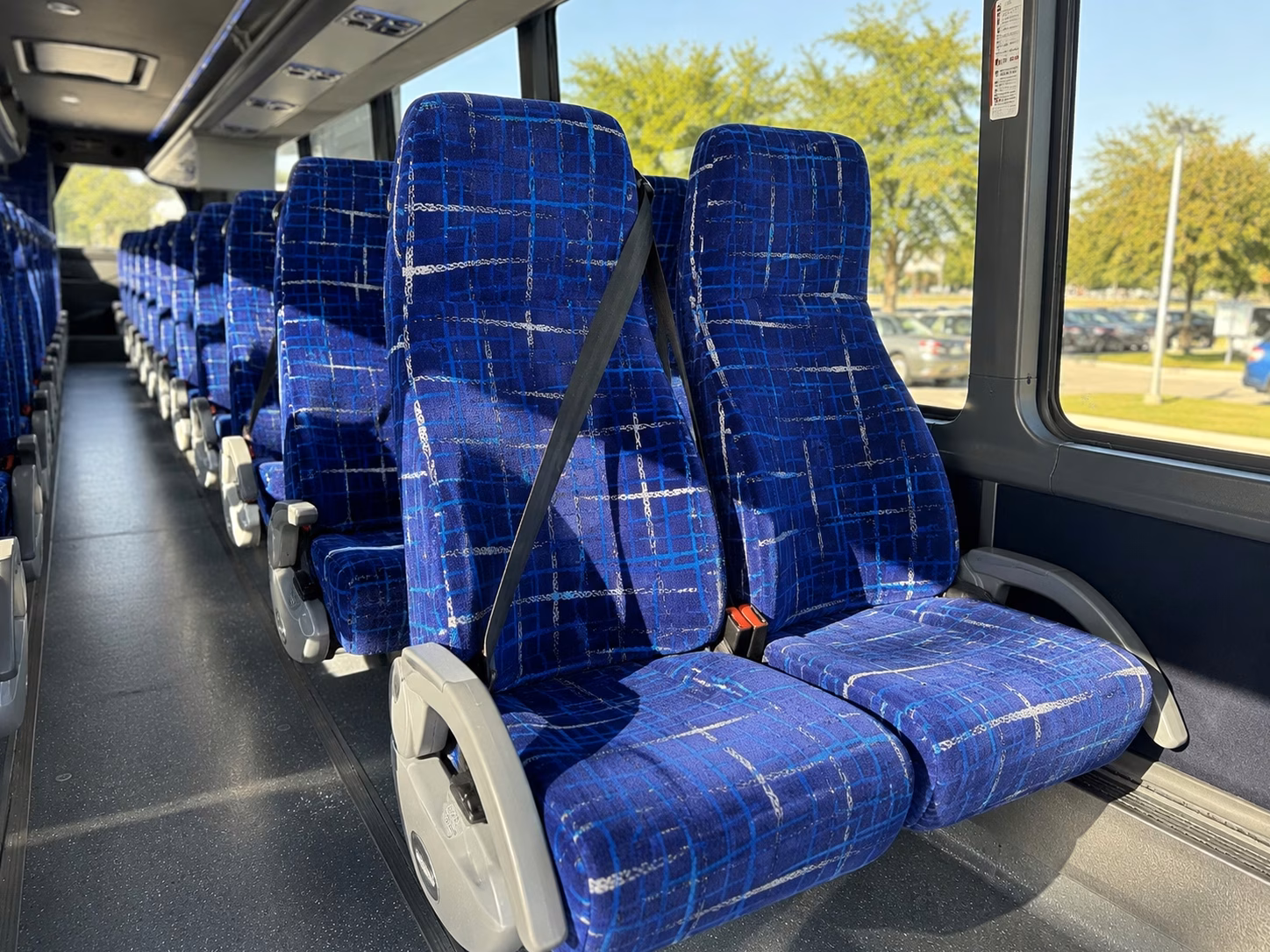 sofi stadium charter bus rentals from south gate for fan groups
