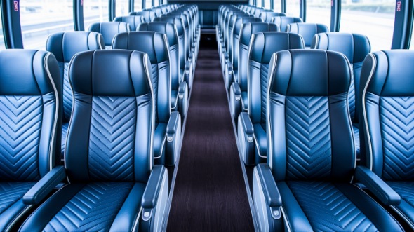 south gate 54 passenger charter bus inside